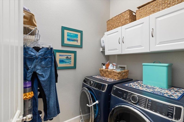 3482 Corte Fortuna, Carlsbad, CA 92009 - laundry area with washer and dryer, cabinet space, and baseboards