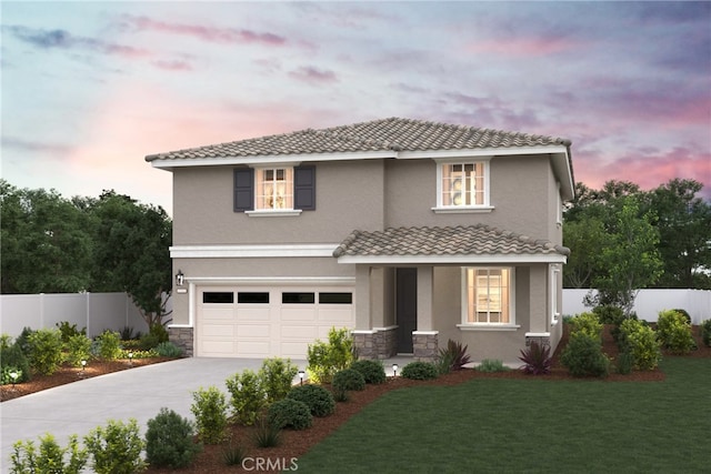 681 Daffodil Ln, San Jacinto, CA 92583 - view of front of home with driveway, an attached garage, stucco siding, covered porch, and stone siding