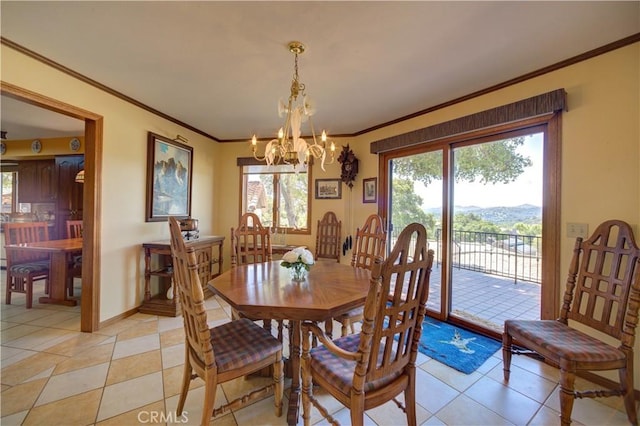 dining room featuring a chandelier, crown molding, light tile patterned flooring, and baseboards