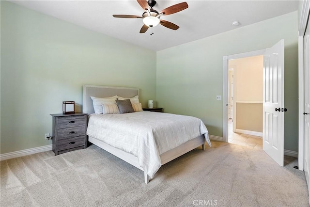 11620 Cenegal Rd, Atascadero, CA 93422 - bedroom with light colored carpet, baseboards, and ceiling fan
