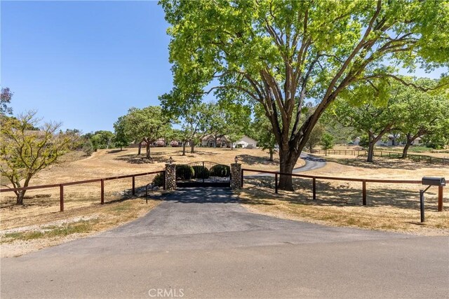 11620 Cenegal Rd, Atascadero, CA 93422 - view of asphalt driveway featuring a gate and a gated entry