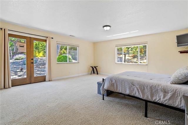 11620 Cenegal Rd, Atascadero, CA 93422 - carpeted bedroom featuring access to exterior, french doors, and baseboards