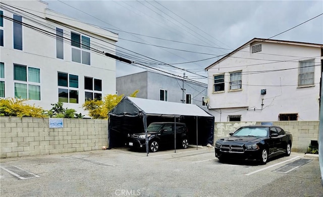 2309 Hauser Blvd, Los Angeles, CA 90016 - uncovered parking lot featuring fence