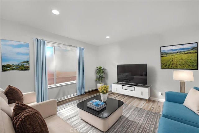 1558 Camelot Dr, Corona, CA 92882 - living area featuring wood finished floors, recessed lighting, and baseboards