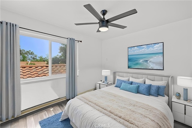 1558 Camelot Dr, Corona, CA 92882 - bedroom featuring wood finished floors, ceiling fan, and baseboards