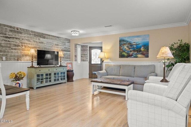 10440 N Karen Ave, Oak View, CA 93022 - living room featuring a wainscoted wall, wood finished floors, and ornamental molding