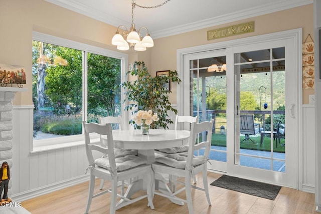 10440 N Karen Ave, Oak View, CA 93022 - dining area featuring a chandelier, crown molding, and light wood-style floors
