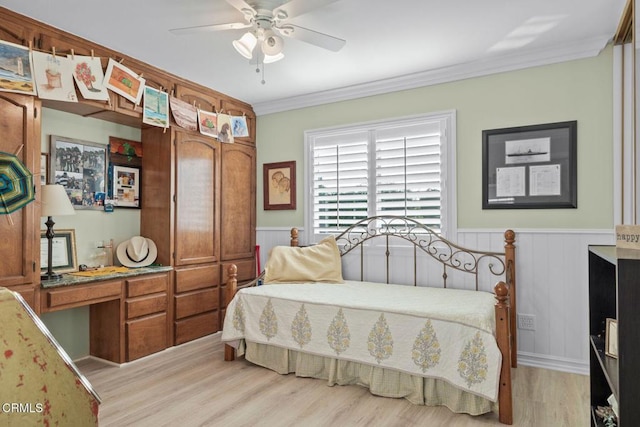 10440 N Karen Ave, Oak View, CA 93022 - bedroom with a wainscoted wall, light wood-style floors, ornamental molding, and a ceiling fan