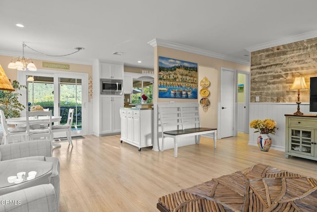 10440 N Karen Ave, Oak View, CA 93022 - living room featuring crown molding, light wood-style floors, a chandelier, a wainscoted wall, and recessed lighting