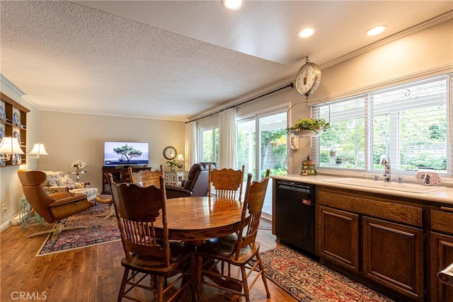 8435 Sale Ave, West Hills, CA 91304 - dining space with light wood-style floors, crown molding, a textured ceiling, and recessed lighting