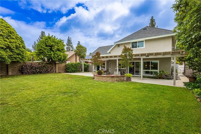 8435 Sale Ave, West Hills, CA 91304 - back of house with stucco siding, a patio, a pergola, and roof with shingles