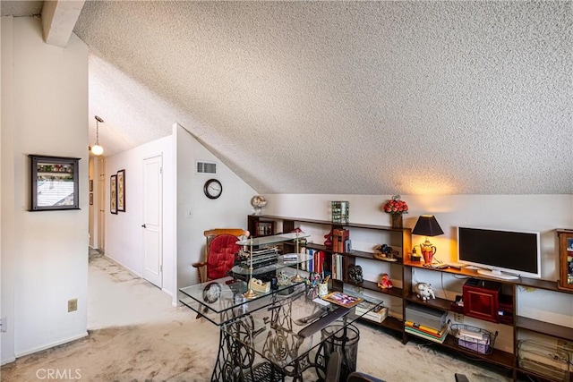 8435 Sale Ave, West Hills, CA 91304 - home office featuring a textured ceiling, vaulted ceiling, and carpet