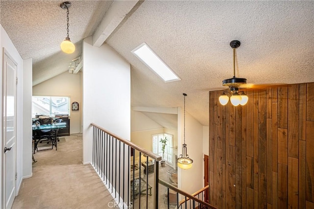 8435 Sale Ave, West Hills, CA 91304 - hall with a textured ceiling, an upstairs landing, light colored carpet, a skylight, and an office area