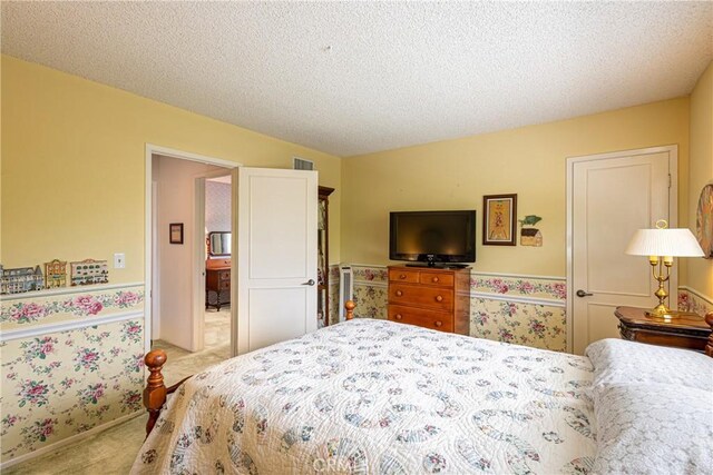 8435 Sale Ave, West Hills, CA 91304 - carpeted bedroom with a textured ceiling