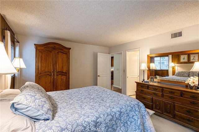 8435 Sale Ave, West Hills, CA 91304 - bedroom with light carpet and a textured ceiling