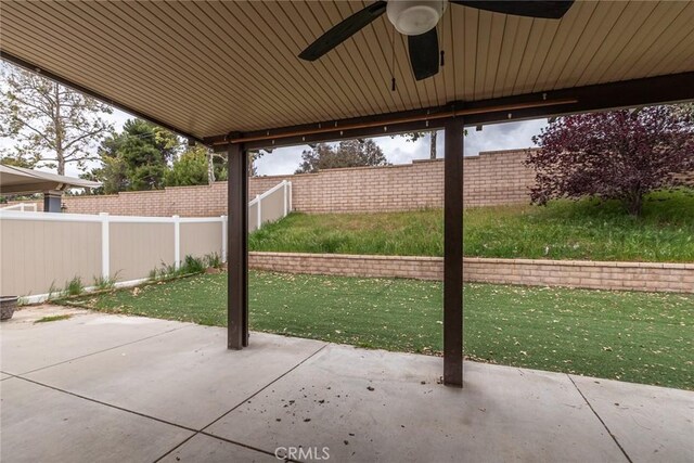 view of patio featuring a ceiling fan