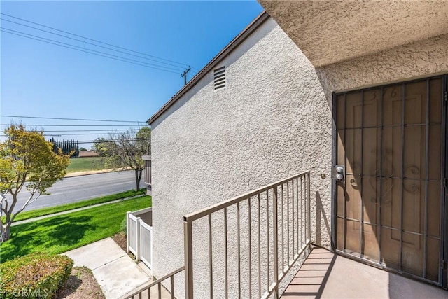 8990 19th St Unit 376, Rancho Cucamonga, CA 91701 - view of exterior entry with stucco siding