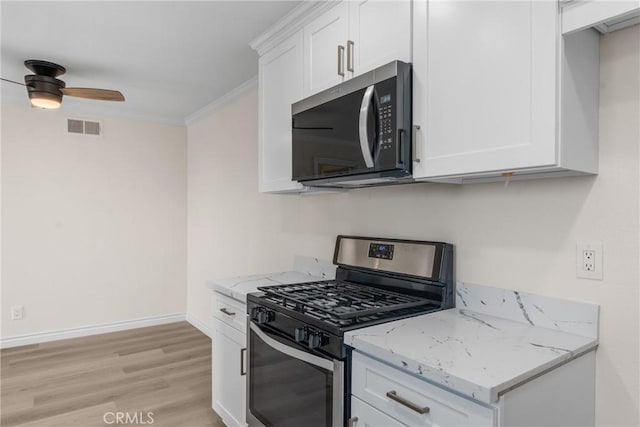 8990 19th St Unit 376, Rancho Cucamonga, CA 91701 - kitchen featuring stainless steel gas range oven, ceiling fan, light stone counters, light wood finished floors, and white cabinets