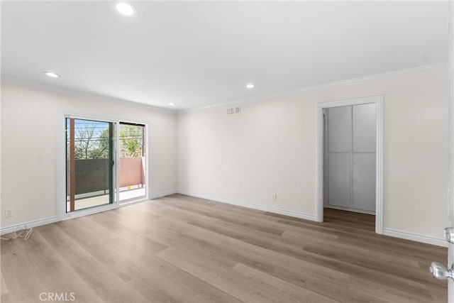 8990 19th St Unit 376, Rancho Cucamonga, CA 91701 - empty room featuring crown molding, light wood-type flooring, recessed lighting, and baseboards