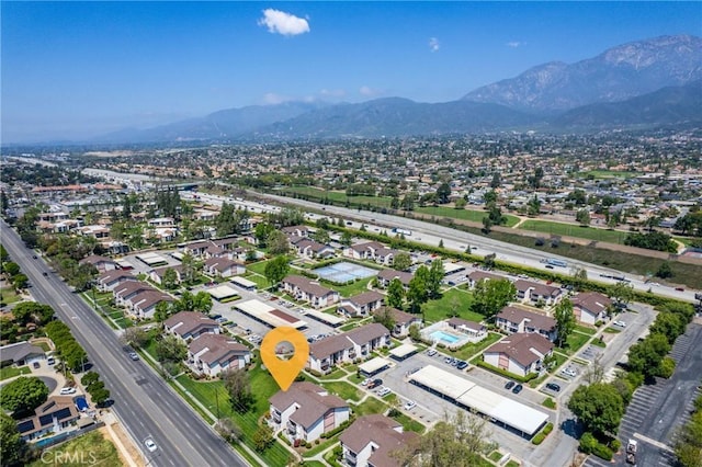 8990 19th St Unit 376, Rancho Cucamonga, CA 91701 - aerial view of property's location featuring a mountainous background and nearby suburban area