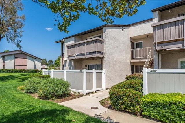 8990 19th St Unit 376, Rancho Cucamonga, CA 91701 - view of building exterior featuring fence