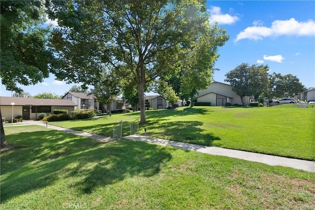 8990 19th St Unit 376, Rancho Cucamonga, CA 91701 - view of green lawn featuring a residential view