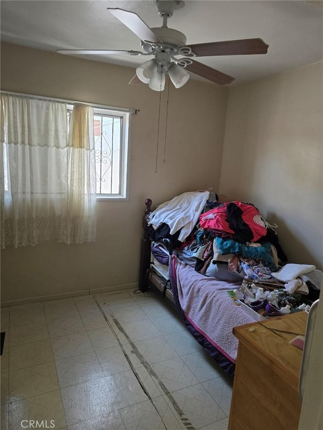 4391 Triggs St, Los Angeles, CA 90023 - bedroom with a ceiling fan and baseboards