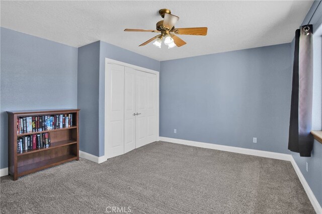 11020 Blue Jay Way, Oak Hills, CA 92344 - unfurnished bedroom with carpet floors, a closet, and baseboards