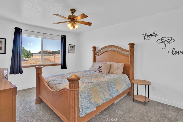 11020 Blue Jay Way, Oak Hills, CA 92344 - carpeted bedroom with baseboards and a ceiling fan