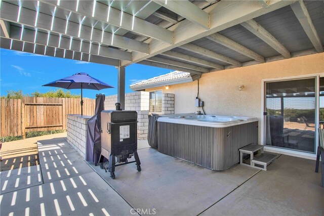 11020 Blue Jay Way, Oak Hills, CA 92344 - view of patio / terrace with a hot tub