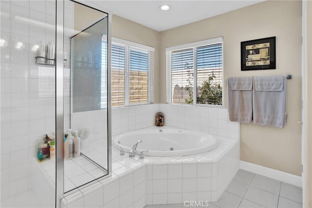 11020 Blue Jay Way, Oak Hills, CA 92344 - full bathroom with a jetted tub, a shower stall, tile patterned flooring, and baseboards