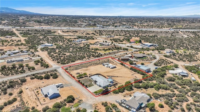 11020 Blue Jay Way, Oak Hills, CA 92344 - aerial view of sparsely populated area featuring property parcel outlined, a desert landscape, and mountains
