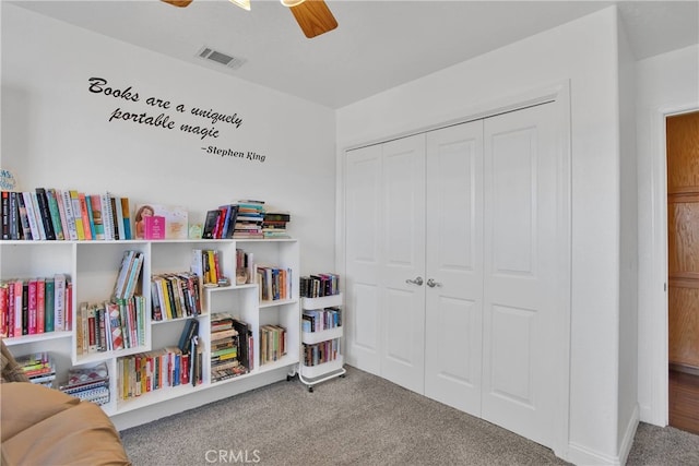 11020 Blue Jay Way, Oak Hills, CA 92344 - sitting room with carpet and ceiling fan