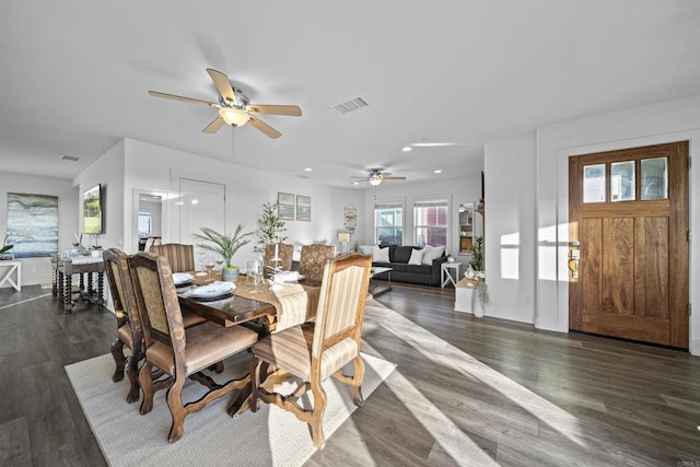 dining space featuring ceiling fan, dark wood-style floors, and recessed lighting