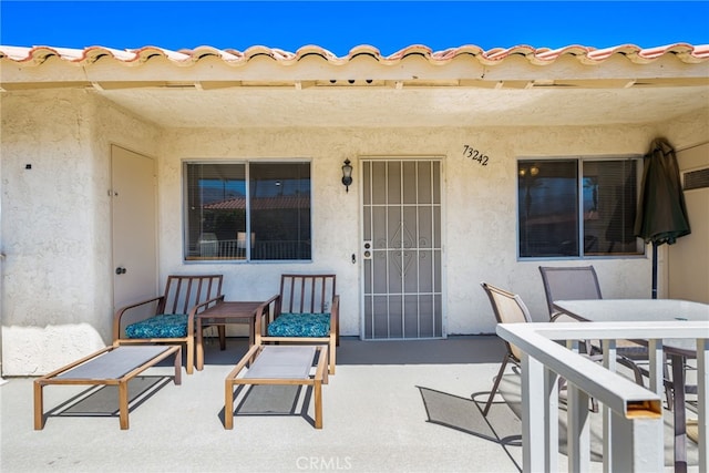 view of patio with outdoor dining area