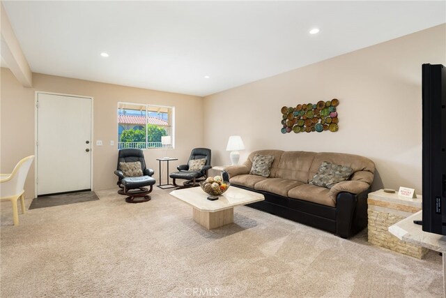 carpeted living room featuring recessed lighting