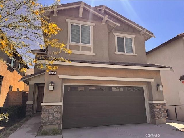 craftsman-style home with an attached garage, stone siding, driveway, and stucco siding