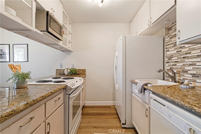 2240 Notre Dame Blvd Unit 6, Chico, CA 95928 - kitchen with white appliances, backsplash, light wood-style floors, baseboards, and open shelves