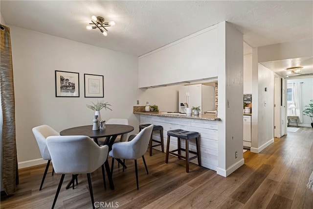 2240 Notre Dame Blvd Unit 6, Chico, CA 95928 - dining area with wood finished floors and baseboards