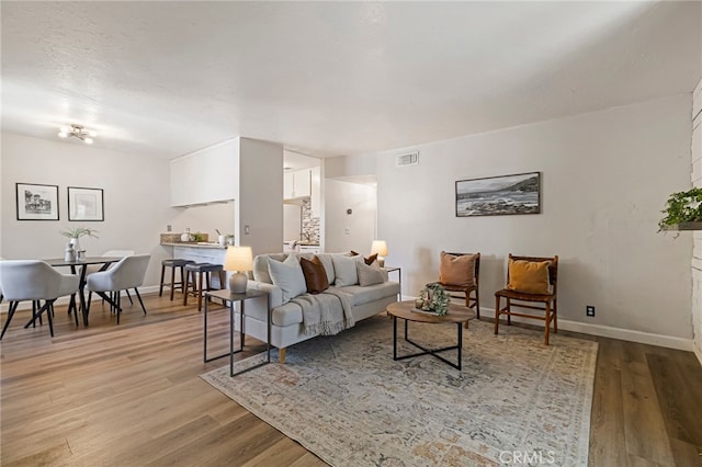 2240 Notre Dame Blvd Unit 6, Chico, CA 95928 - living room with light wood finished floors and baseboards
