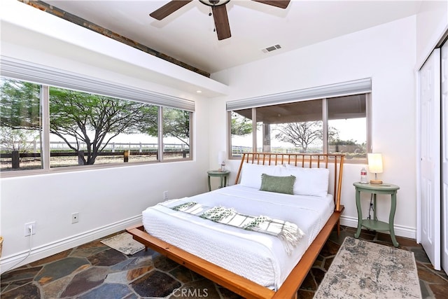 40125 Camino Del Vino, Temecula, CA 92592 - bedroom with baseboards, ceiling fan, and a closet