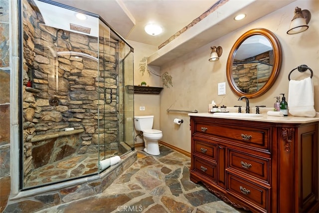 40125 Camino Del Vino, Temecula, CA 92592 - bathroom with stone floors, toilet, a shower stall, and vanity