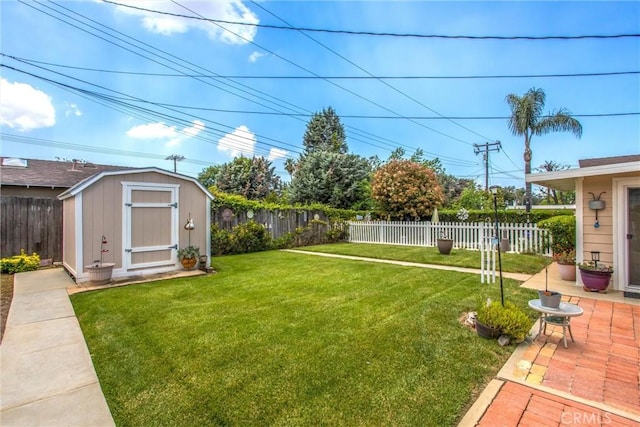 217 Syllmar Cir, Calimesa, CA 92320 - view of yard featuring a shed, a patio area, and an outdoor structure