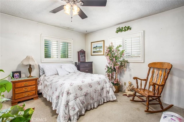 217 Syllmar Cir, Calimesa, CA 92320 - bedroom with carpet, a textured ceiling, and ceiling fan
