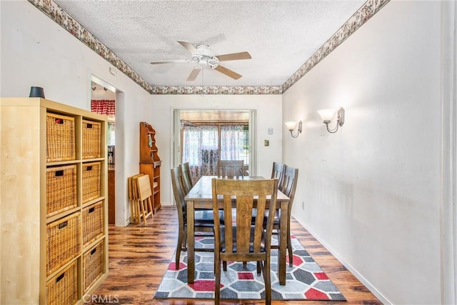 217 Syllmar Cir, Calimesa, CA 92320 - dining area featuring a textured ceiling, wood finished floors, and a ceiling fan