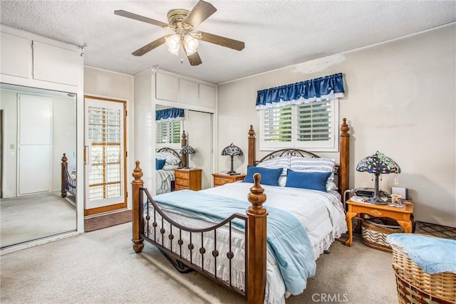217 Syllmar Cir, Calimesa, CA 92320 - bedroom featuring carpet flooring, a textured ceiling, a ceiling fan, and a closet