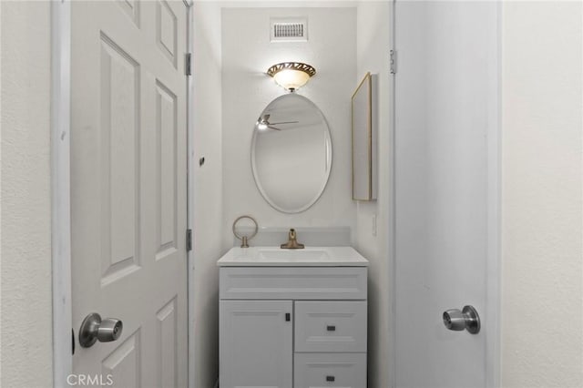 bathroom with vanity and ceiling fan