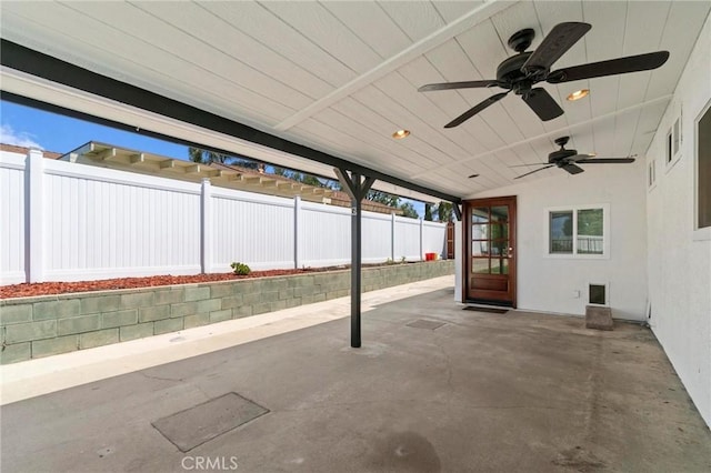 view of patio with a ceiling fan and a fenced backyard