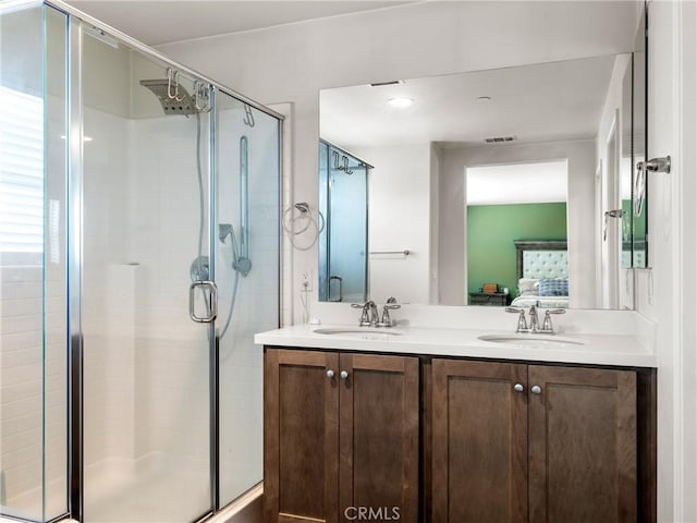 10630 Appaloosa Ave, Hesperia, CA 92345 - full bath featuring ensuite bath, a shower with shower door, and double vanity