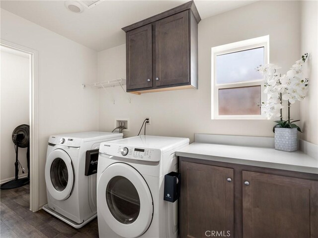 10630 Appaloosa Ave, Hesperia, CA 92345 - laundry area with cabinet space, independent washer and dryer, and dark wood-style flooring